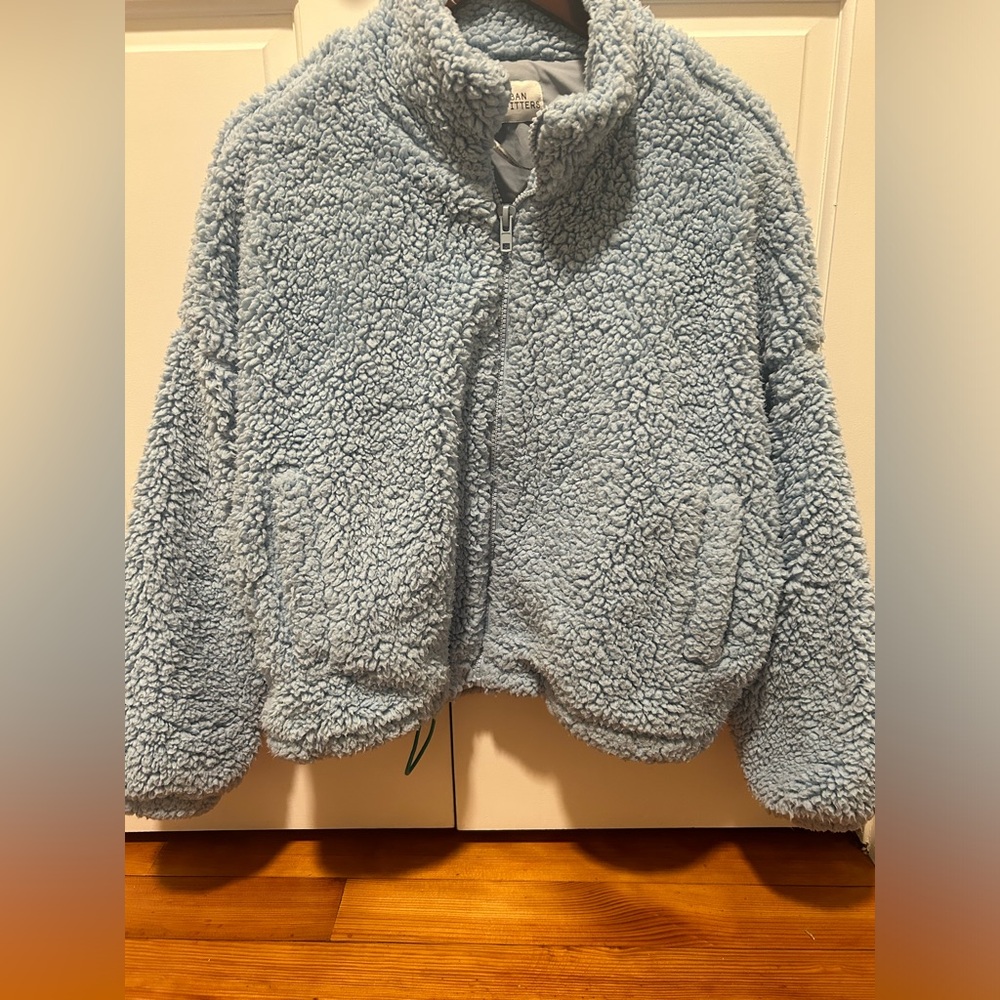 Blue sweatshirts